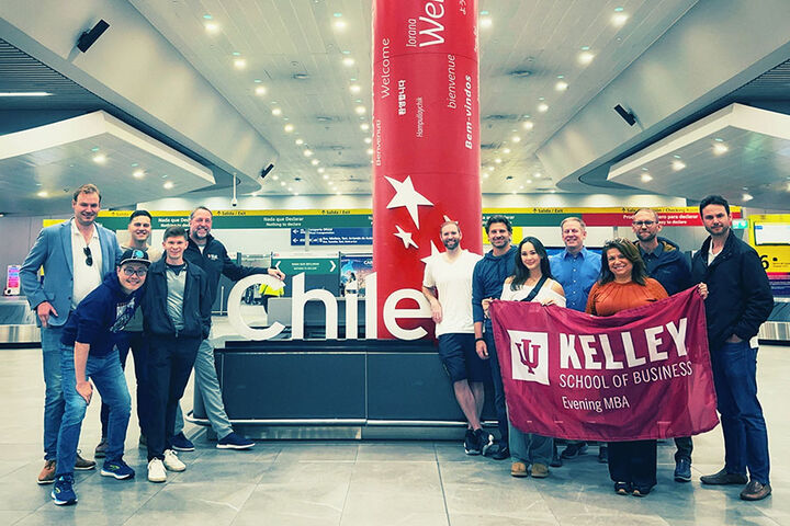 Two Kelley students stand in the street of an international city.